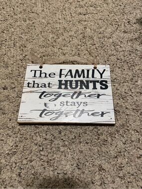 Rustic White Wooden Wall Sign "The Family That Hunts Together"